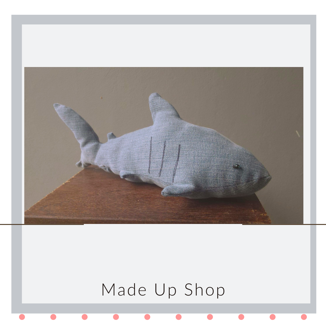 Recycled denim shark stuffy toy.